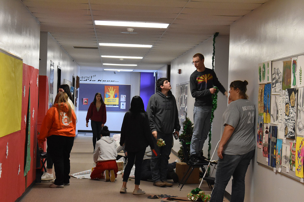 Students Decorating Hallway.